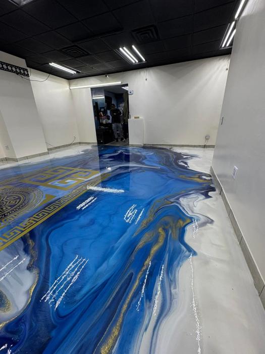 Epoxy floor coating for a Iowa City, Iowa home by Resinate Coatings