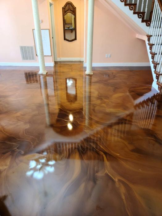 Epoxy floor coating for a North Liberty, Iowa home by Resinate Coatings