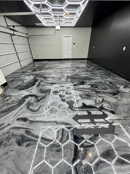 Epoxy floor coating for a Hiawatha, Iowa home by Resinate Coatings