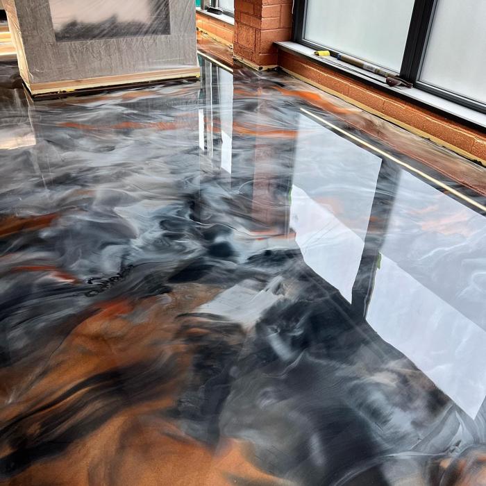 Epoxy floor coating for a Cedar Falls, Iowa home by Resinate Coatings