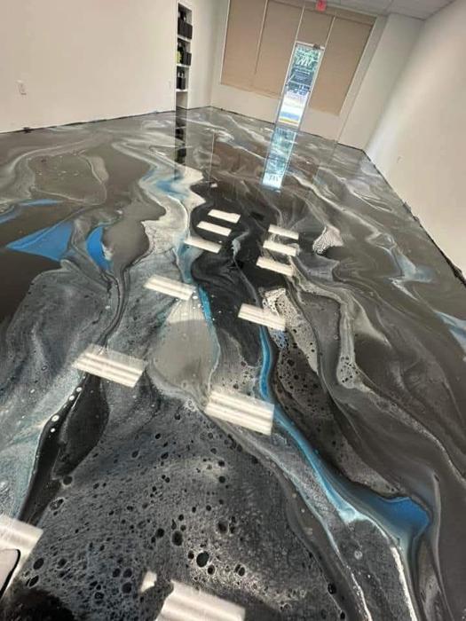 Epoxy floor coating for a Waterloo, Iowa home by Resinate Coatings