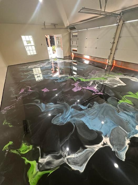 Epoxy floor coating for a Coralville, Iowa home by Resinate Coatings
